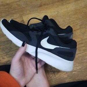 black and white Nike sneakers